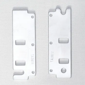 Uchwyty Sewtech TA3611/TA3612 do hafciarki Tajima – para metalowych uchwytów, widok płaskich powierzchni.